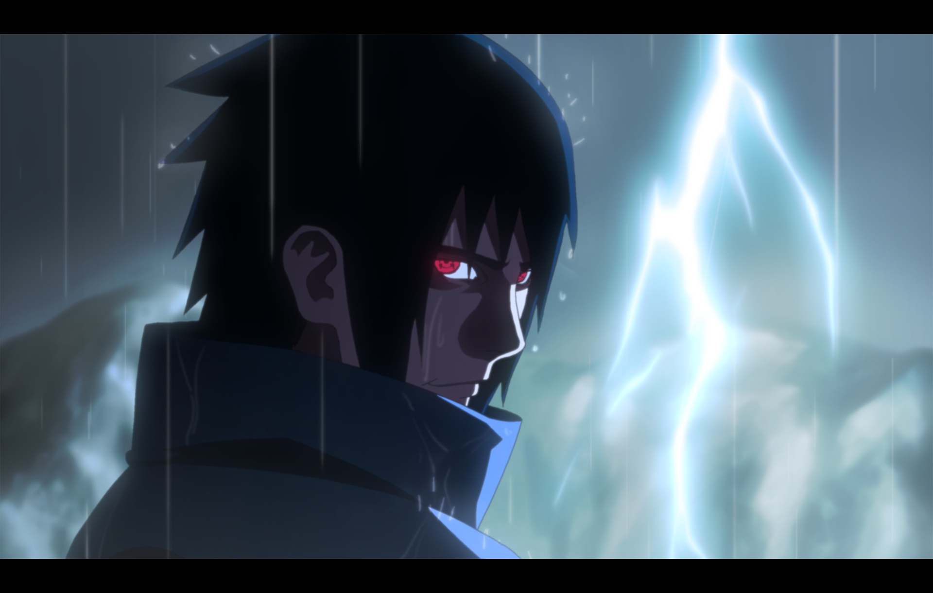 Sasuke Uchiha's Sharingan in striking detail against a dark background, embodying the power of the Uchiha Clan in this dynamic anime wallpaper.