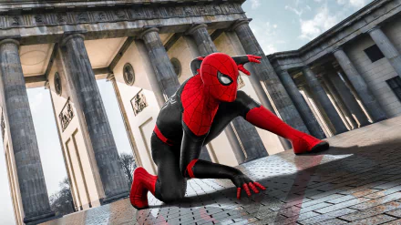 Spider-Man (Peter Parker) in a dynamic pose against the backdrop of historic architecture. This HD wallpaper is from the movie Spider-Man: Far From Home.