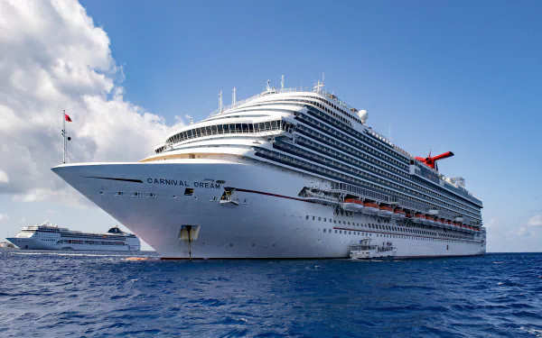 4K Ultra HD wallpaper of the Carnival Dream cruise ship sailing smoothly on the ocean under a partly cloudy sky.