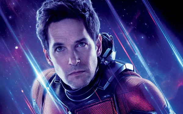 HD PC desktop wallpaper featuring Paul Rudd as Ant-Man from Avengers Endgame with a cosmic background and glowing light streaks.