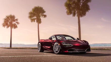 A sleek red McLaren 720S supercar parked by the waterfront with palm trees under a soft, pastel sky in this 4K Ultra HD PC desktop wallpaper.