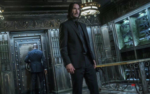 Keanu Reeves as John Wick in a dark, ornate room from John Wick: Chapter 3 - Parabellum, presented as a 4K Ultra HD PC desktop wallpaper.