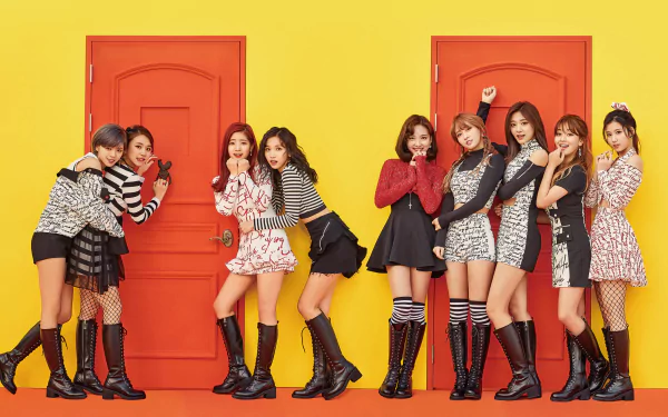 K-pop girl group Twice poses confidently in stylish boots and brunette hairstyles against a vibrant yellow backdrop with two red doors in this 4K Ultra HD wallpaper.