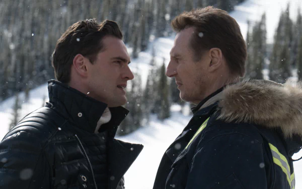 Two characters face off in a snowy landscape from the movie Cold Pursuit, featuring Liam Neeson. This HD image captures the intensity of their confrontation.