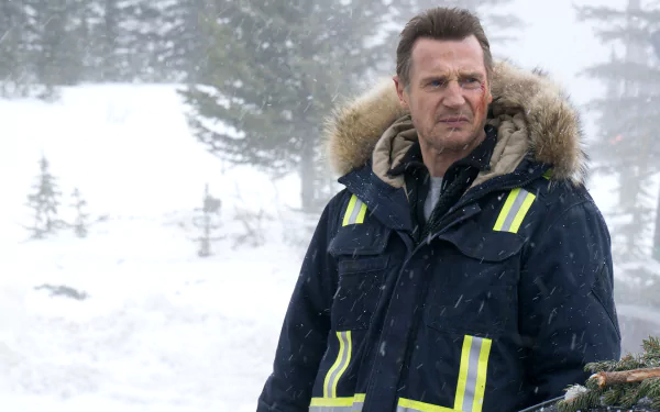 HD wallpaper featuring Liam Neeson in Cold Pursuit, set against a snowy background.