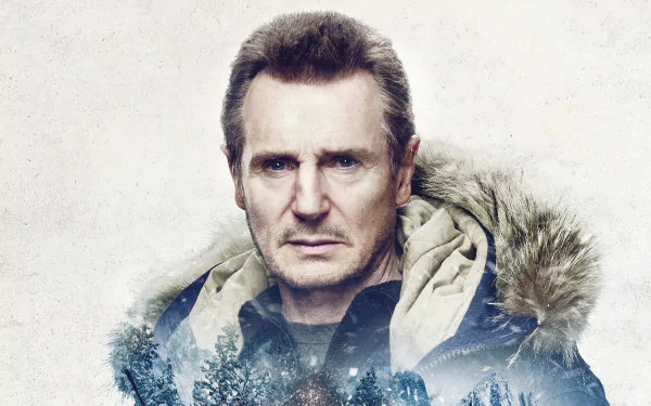 HD desktop wallpaper featuring the actor from Cold Pursuit in a winter jacket against a snowy backdrop.