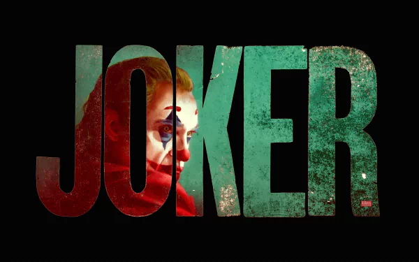 Bold JOKER logo with the Joker's painted face revealed inside distressed green-and-red letters on a black background — DC Comics movie 8K Ultra HD PC desktop wallpaper.