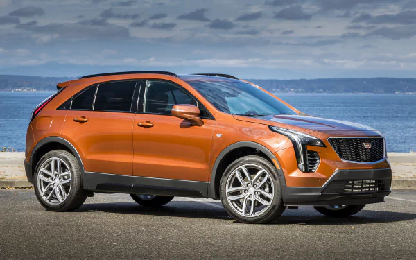 orange car SUV car Cadillac vehicle Cadillac XT4 HD Desktop Wallpaper | Background Image
