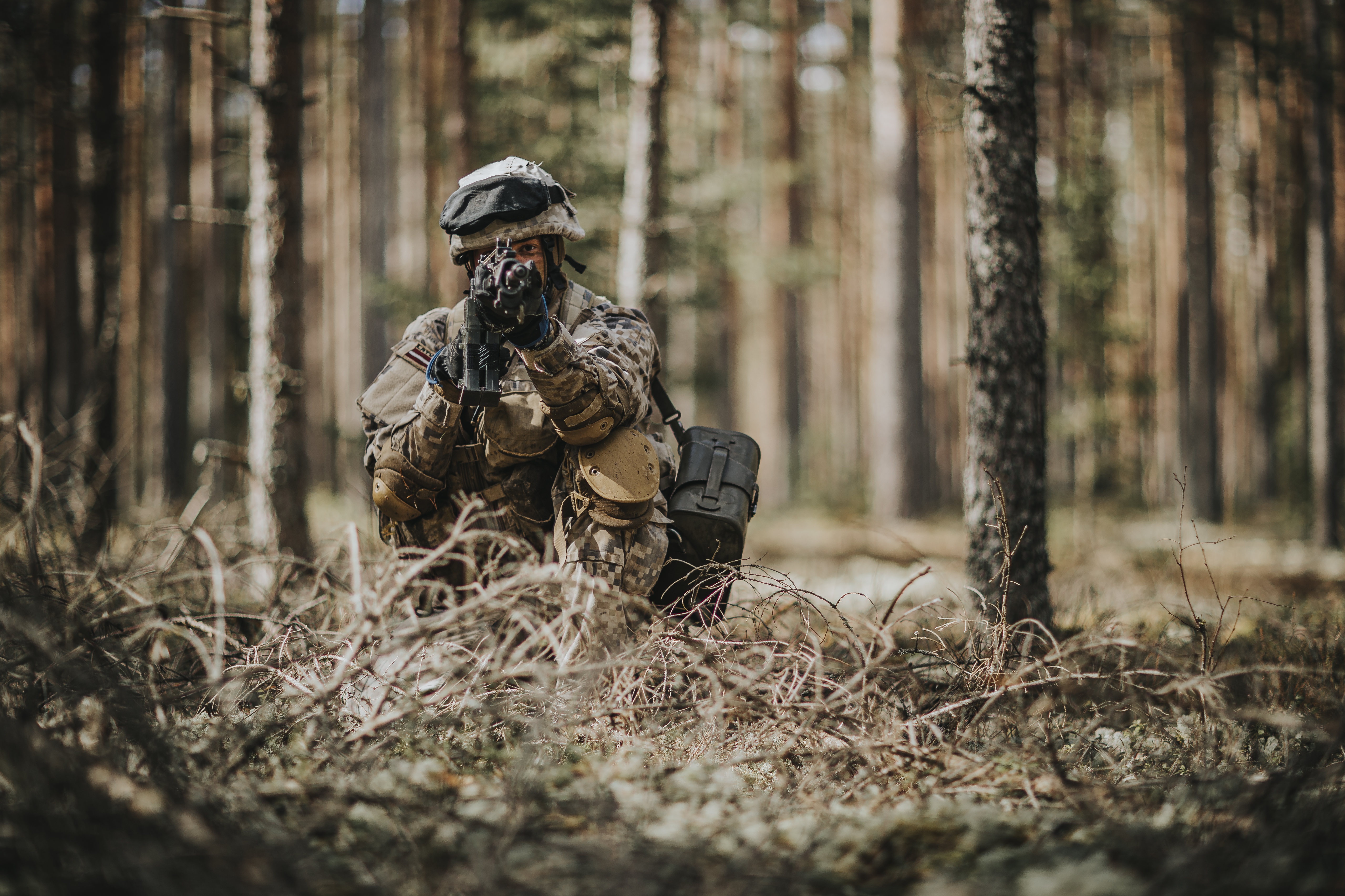 Latvian soldier in the forest