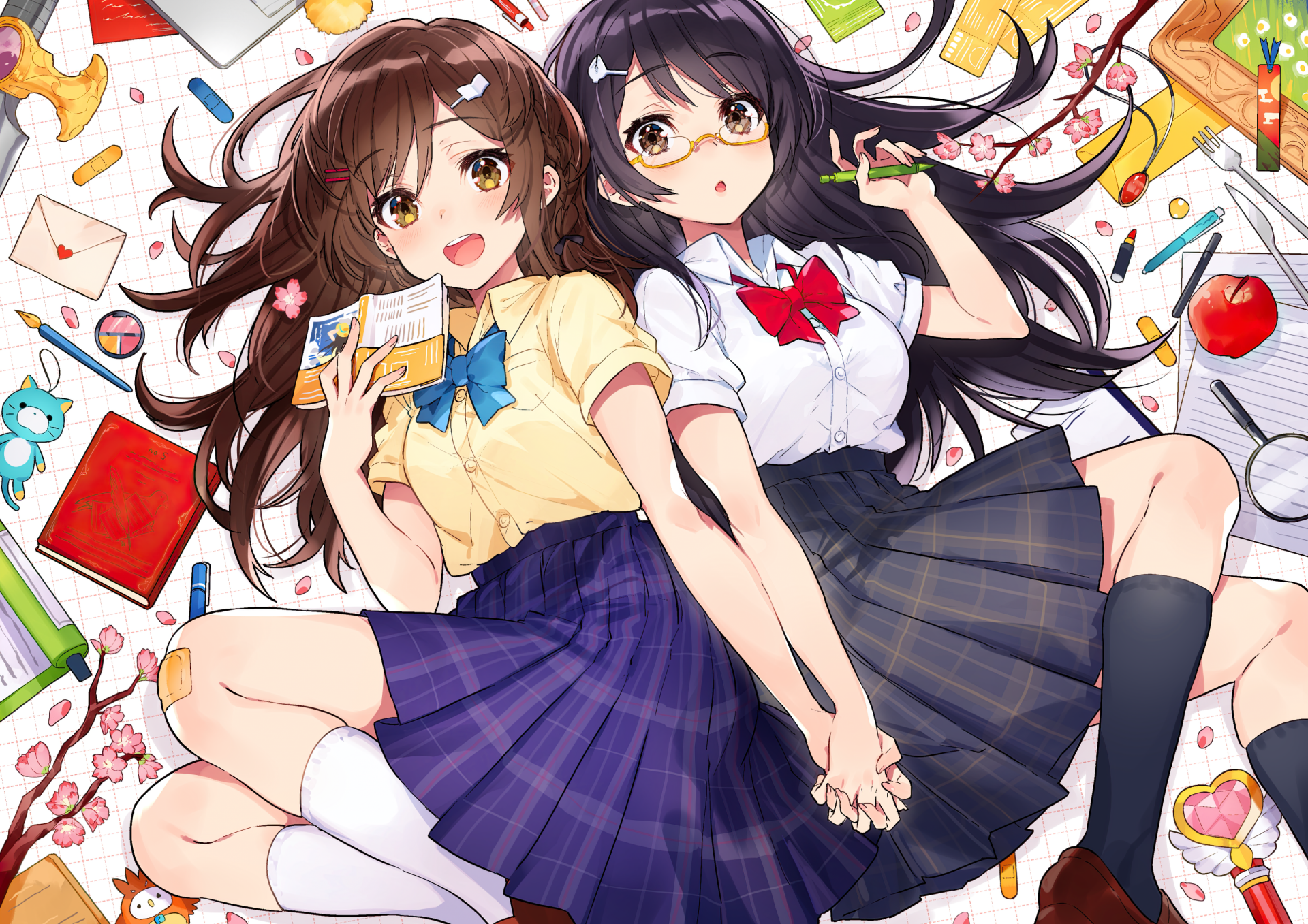 HD anime desktop wallpaper featuring two cheerful anime girls in school uniforms holding hands, surrounded by colorful stationery and sweets.