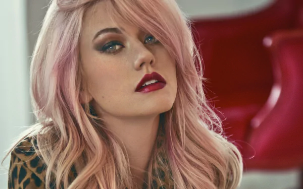 Close-up portrait of American actress Katherine McNamara with pink hair, blonde highlights, and bold lipstick, captured in 4K Ultra HD quality.