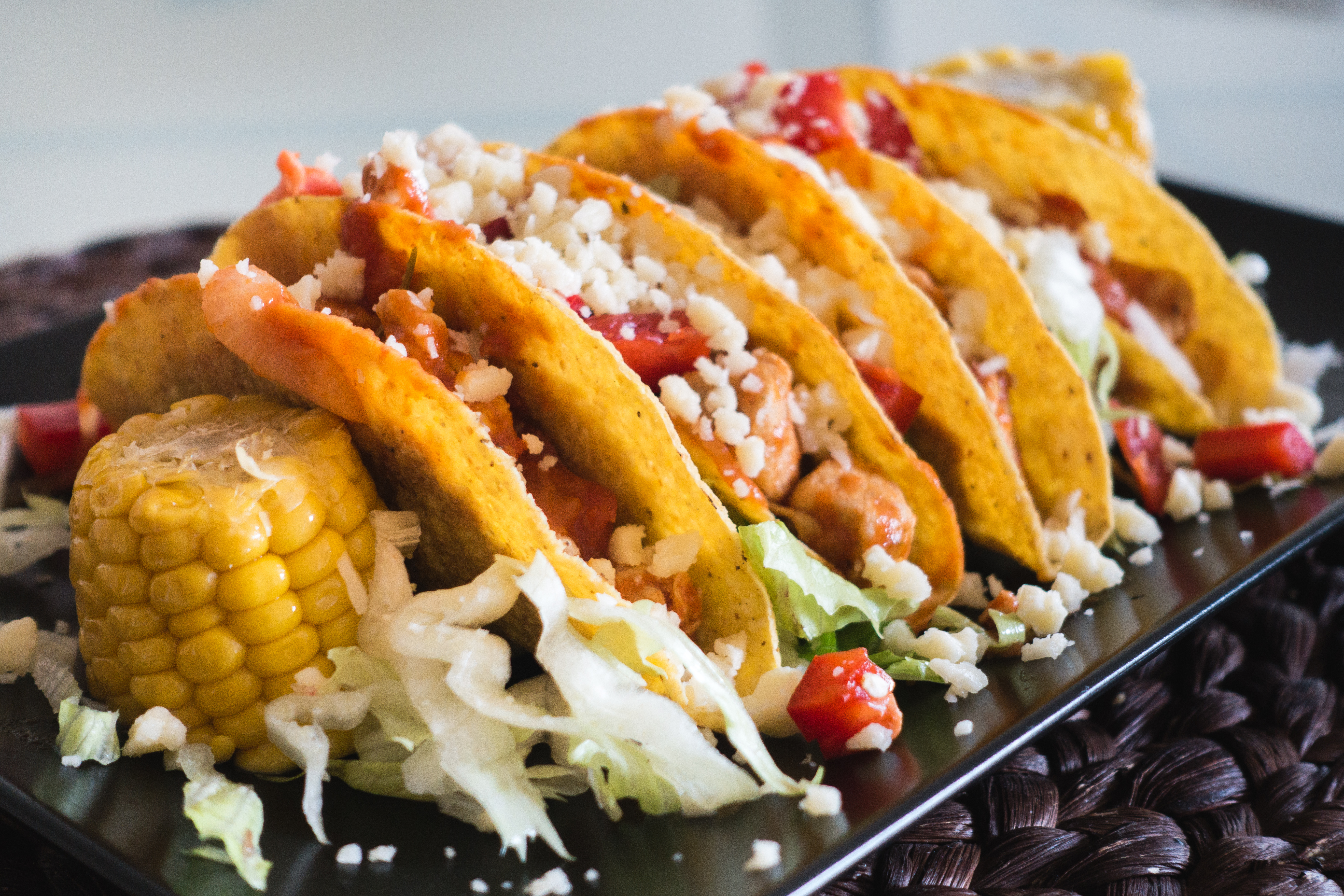 Tasty chicken tacos with cheese by Jakub Kapusnak