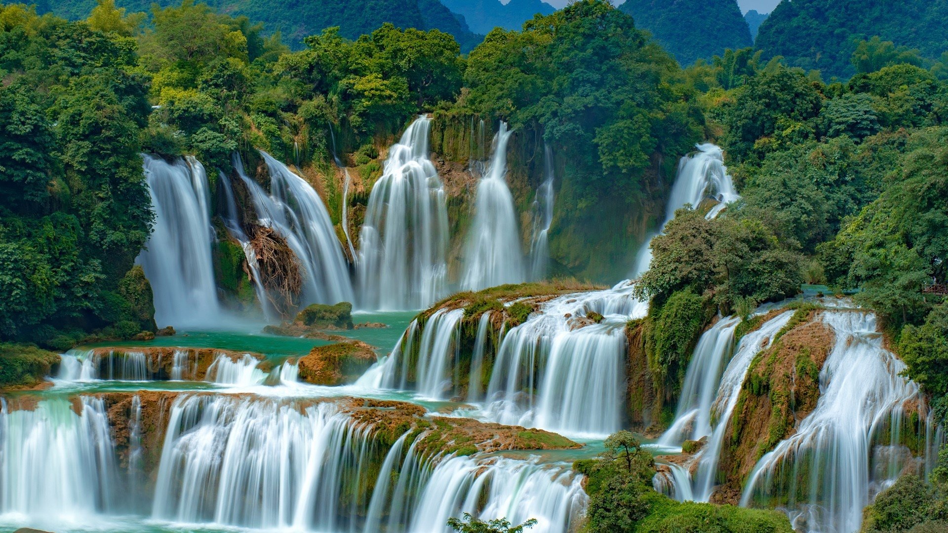 ban gioc waterfall wooden bridge