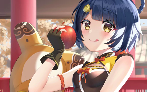 HD desktop wallpaper featuring Xiangling from the video game Genshin Impact, holding a red apple with her companion Guoba in the background.