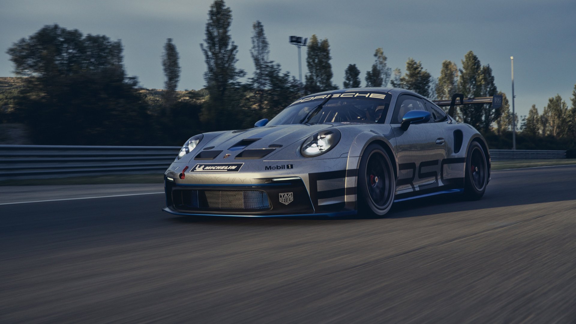Silver Porsche 911 GT3 racing on track — 4K Ultra HD PC desktop wallpaper/background featuring a Porsche 911 sports car.