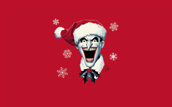 The Joker from Batman: The Animated Series grinning in a Santa hat with holly, surrounded by snowflakes on a red 2K Quad HD PC wallpaper background.