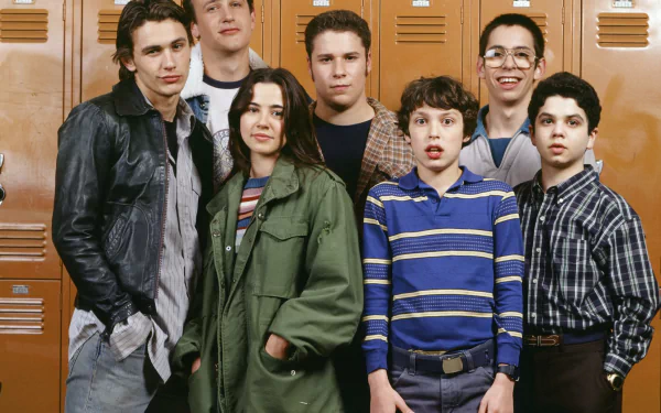 HD desktop wallpaper featuring the cast of Freaks and Geeks posing in front of school lockers.
