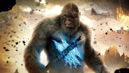 4K Ultra HD PC desktop wallpaper featuring King Kong from the movie Godzilla vs Kong, holding a glowing, intricately designed axe amidst a shattered, stormy background.