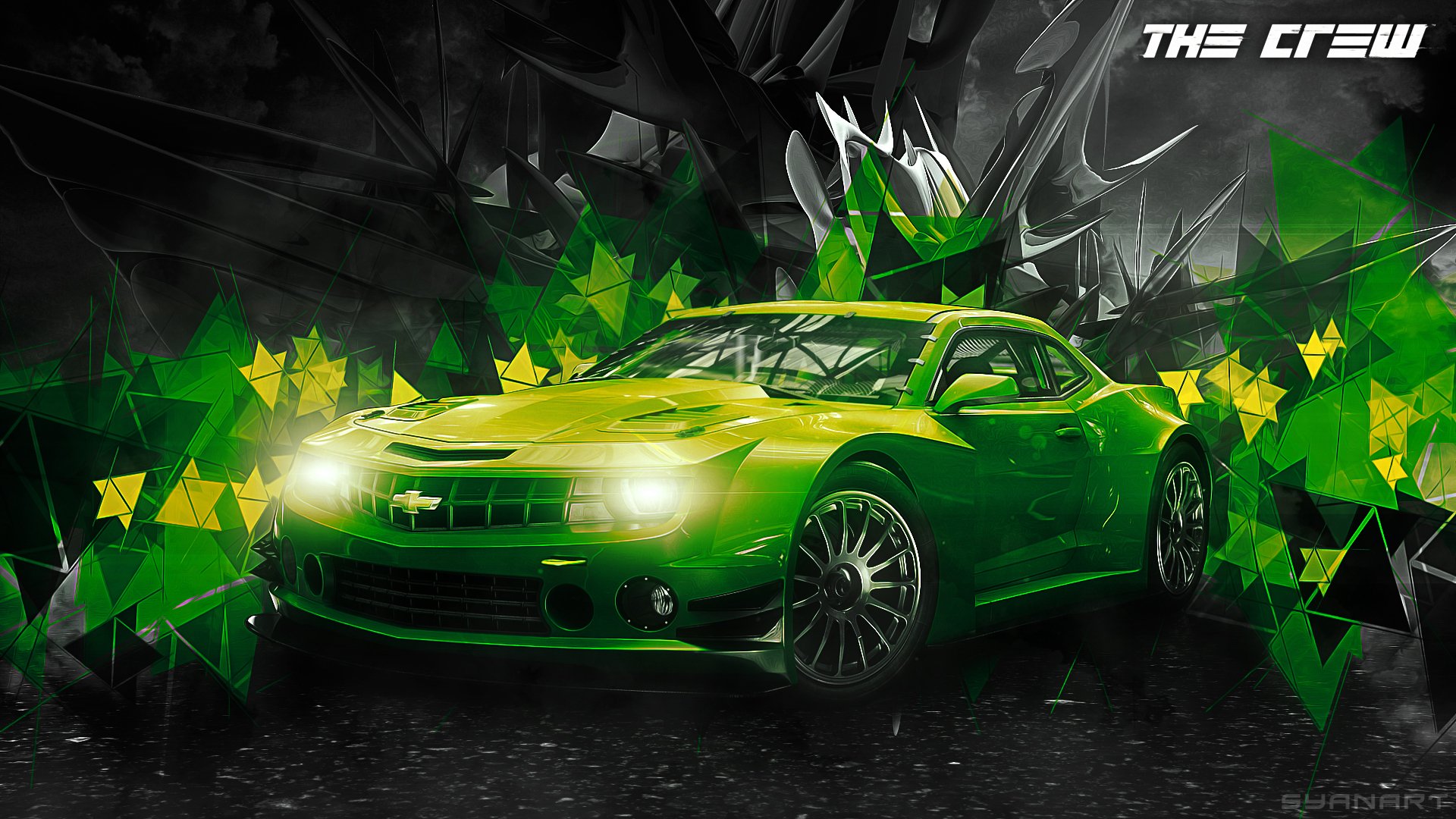 HD PC wallpaper of a bright green Chevrolet Camaro from the video game The Crew, racing forward amid geometric green shards and a dark abstract desktop background.