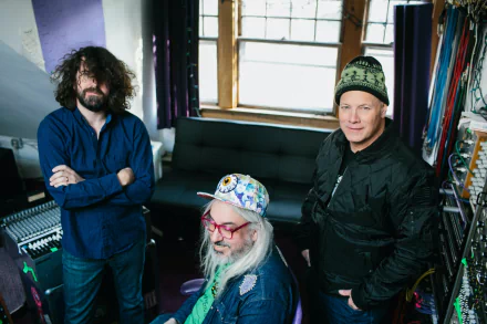 HD desktop wallpaper featuring the band Dinosaur Jr. posing together in a music studio setting.