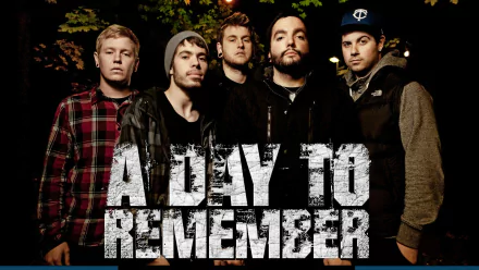 HD wallpaper of the band A Day To Remember posing for a group photo with the band's name overlaid in bold text.