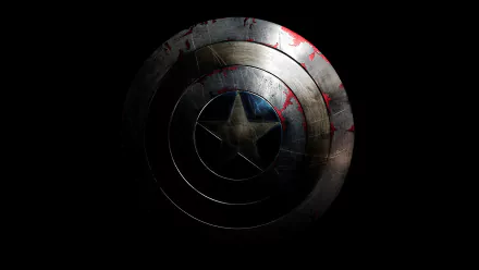 Weathered Captain America shield from the movie Captain America: The Winter Soldier, blood-streaked and worn on a black field — 8K Ultra HD PC desktop wallpaper and background.