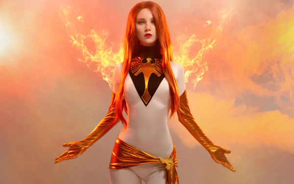 A 4K Ultra HD PC desktop wallpaper featuring a redhead woman cosplaying as Jean Grey from X-Men, surrounded by fiery, glowing energy effects.