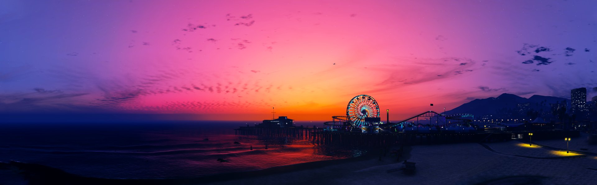 4K Ultra HD PC desktop wallpaper featuring a vibrant sunset over the iconic pier from the video game Grand Theft Auto V.