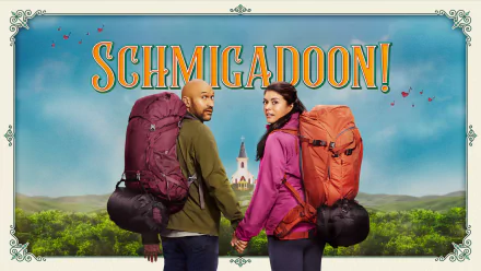 HD wallpaper of two hikers with backpacks facing a whimsical town, entitled 'Schmigadoon!' with vibrant scenery and playful font.