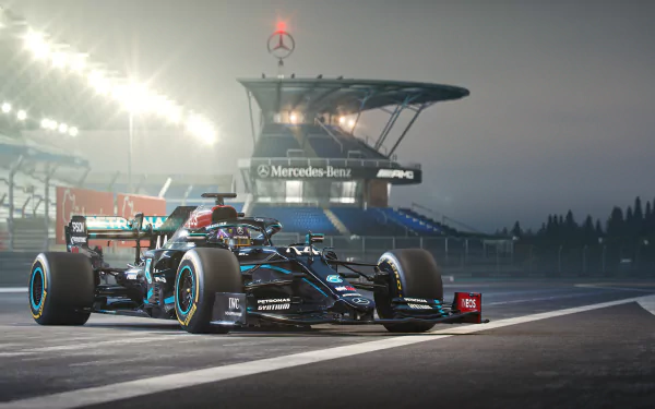 Mercedes-AMG F1 W11 EQ Performance race car on the track, captured in a 4K Ultra HD F1 sports wallpaper and background.