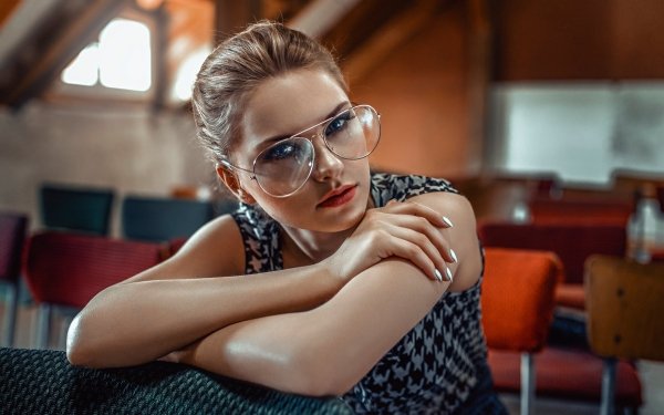 Model glasses licking subway