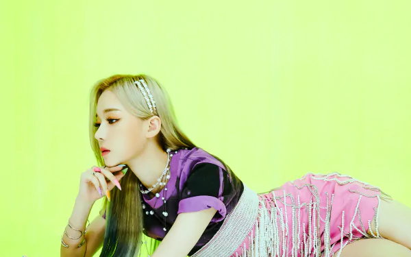 4K Ultra HD desktop wallpaper of Winter from Aespa, featuring vibrant colors and a stylish pose, highlighting her music and iconic visual presence.