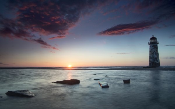 Man Made Lighthouse Sea Sunset Horizon HD Wallpaper | Background Image