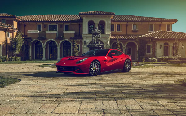 A sleek Ferrari F12berlinetta supercar captured in a stunning HD desktop wallpaper and background.