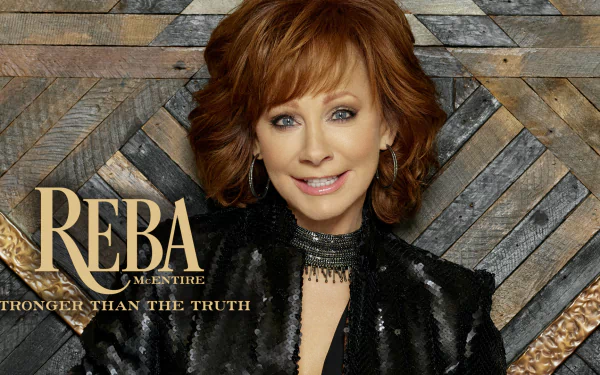 HD desktop wallpaper featuring a styled woman with auburn hair and black attire against a geometric wooden backdrop with the text 'REBA Stronger Than The Truth.'