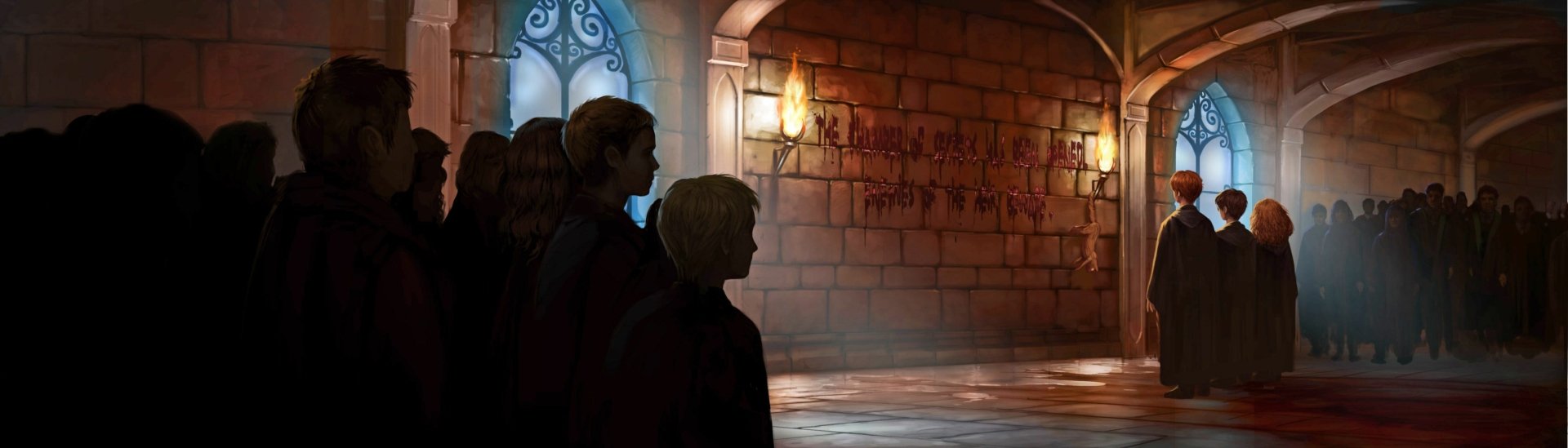 2K Quad HD PC desktop wallpaper: Hermione Granger, Ron Weasley and Harry Potter in a torchlit Hogwarts corridor, facing blood‑smeared writing on the wall — from the Harry Potter and the Chamber of Secrets movie.