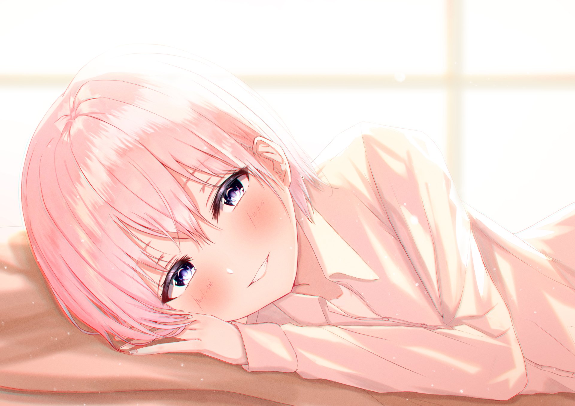 HD PC desktop wallpaper: Ichika Nakano (Anime, The Quintessential Quintuplets) — soft-lit close-up of her lying down, pink hair, warm eyes and a gentle smile.