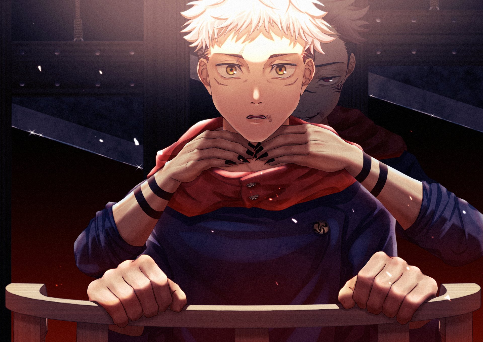 HD anime desktop wallpaper featuring Yuji Itadori from Jujutsu Kaisen, with intense lighting highlighting his determined expression against a dark, dramatic background.