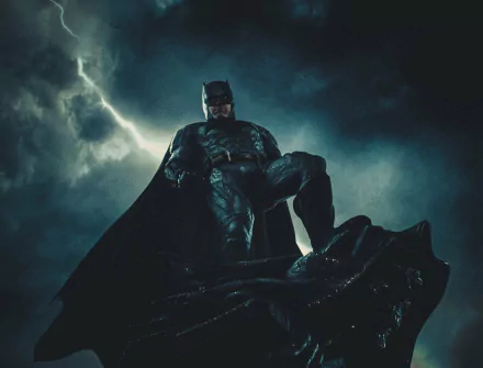Batman stands heroically against a stormy sky in this HD PC desktop wallpaper from Zack Snyder's Justice League movie.