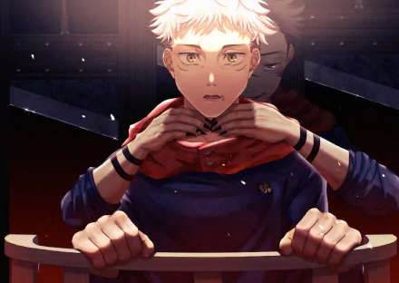 HD anime desktop wallpaper featuring Yuji Itadori from Jujutsu Kaisen, with intense lighting highlighting his determined expression against a dark, dramatic background.