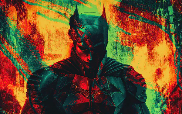 A striking 4K Ultra HD desktop wallpaper of Batman from the movie The Batman, featuring bold colors and intense lighting that highlight the Dark Knight’s armored suit.