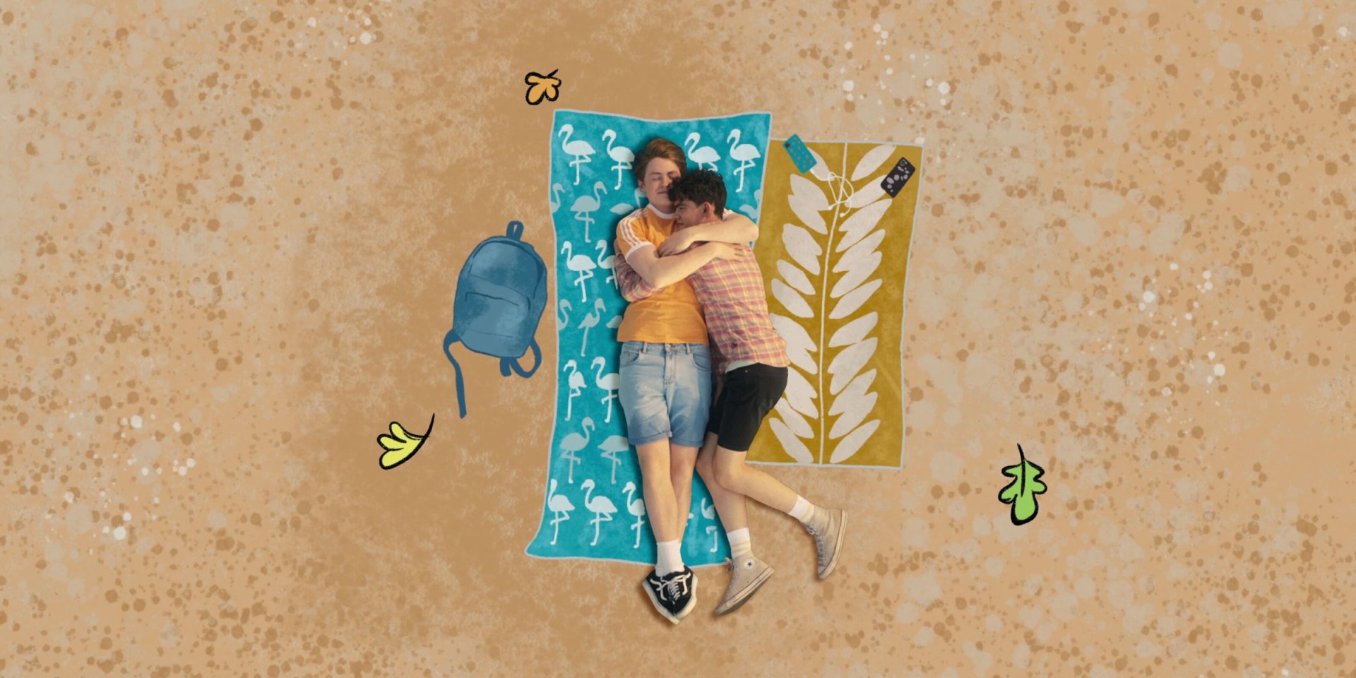HD desktop wallpaper featuring characters from the TV show Heartstopper lying on colorful towels against a sandy background with scattered backpack and leaves.