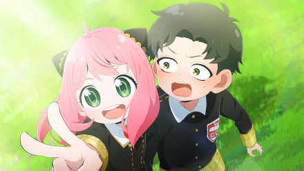 Anya Forger flashes a peace sign beside a startled Damian Desmond in school uniforms on sunlit grass — Spy x Family anime, 4K Ultra HD PC desktop wallpaper.