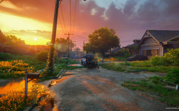 A 4K Ultra HD PC desktop wallpaper featuring a sunset-lit rural street from The Last of Us Part I video game.