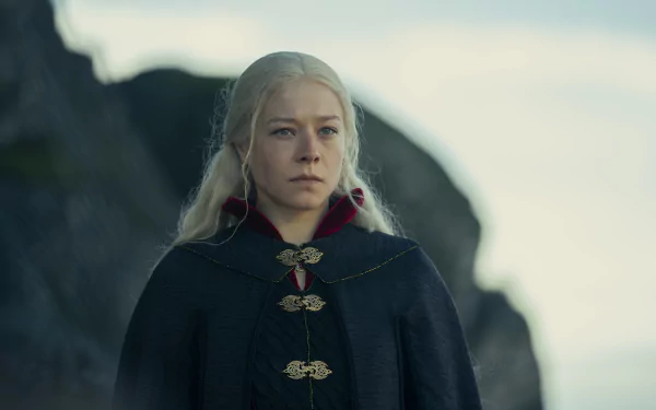 Rhaenyra Targaryen from House of the Dragon, standing in a dark cloak on a windswept cliff — 4K Ultra HD PC desktop wallpaper/background.