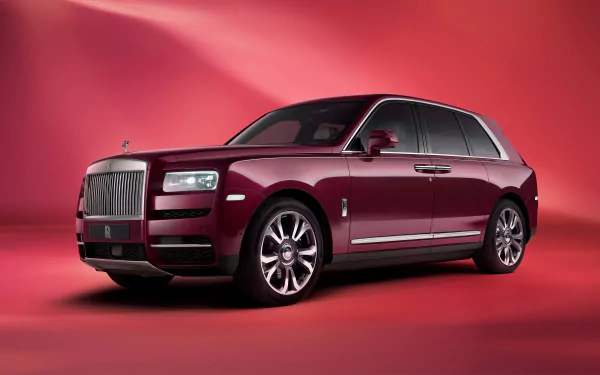 Luxurious Rolls-Royce Cullinan displayed in high-definition on a desktop wallpaper and background.