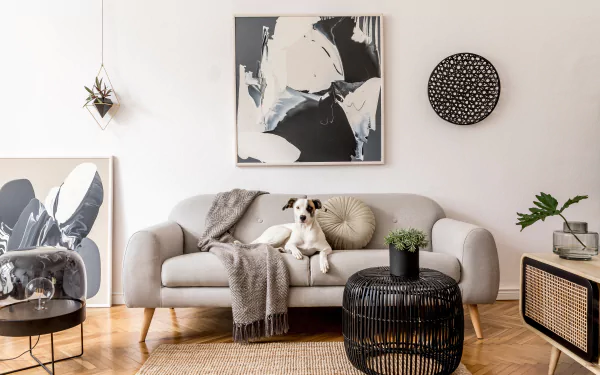 Cozy living room featuring a dog sitting on a modern sofa, surrounded by abstract art and stylish decor, captured in 4K Ultra HD for a PC desktop wallpaper.