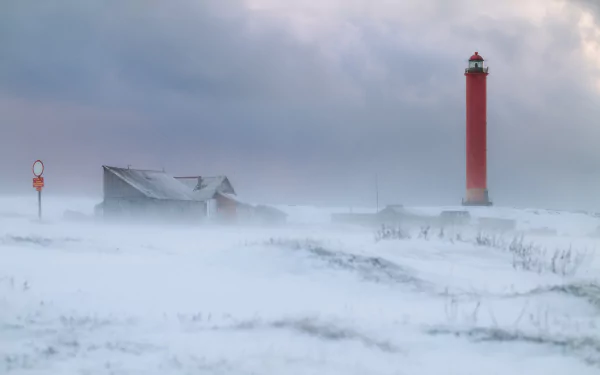 A stunning HD desktop wallpaper of a man-made lighthouse standing tall against the backdrop of a beautiful sky.