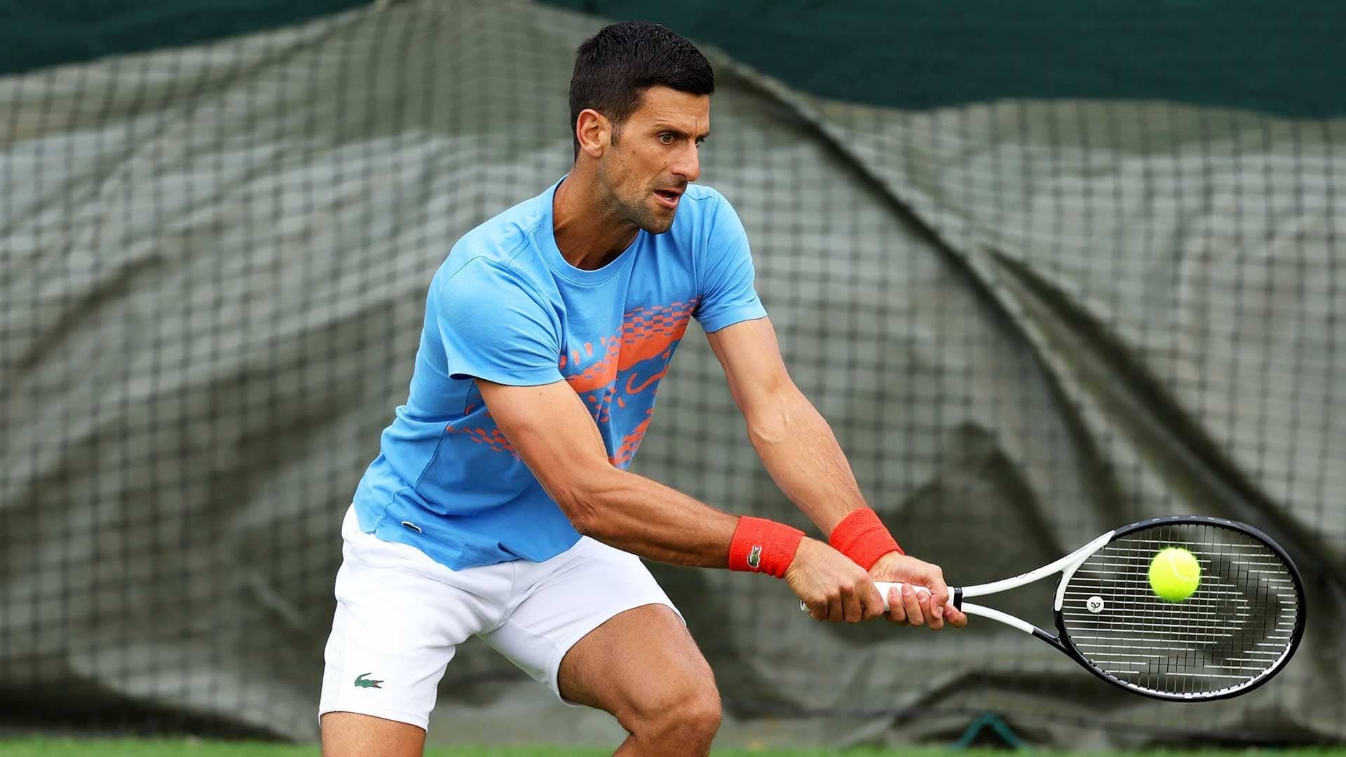 Tennis player in action at Wimbledon 2023, HD desktop wallpaper.