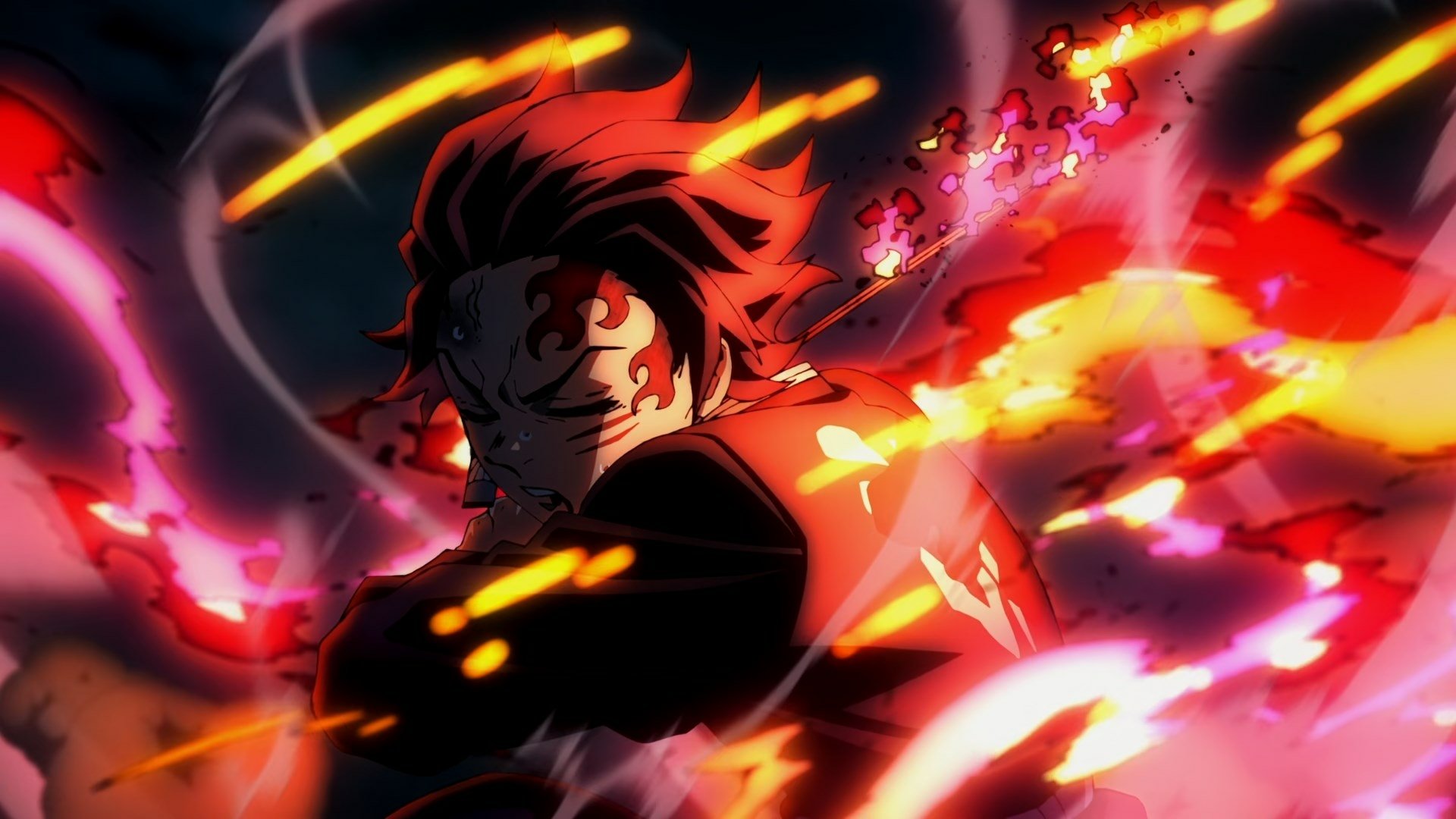 HD desktop wallpaper featuring intense battle scene from Anime Demon Slayer: Kimetsu no Yaiba, with a character surrounded by vibrant, fiery energy.